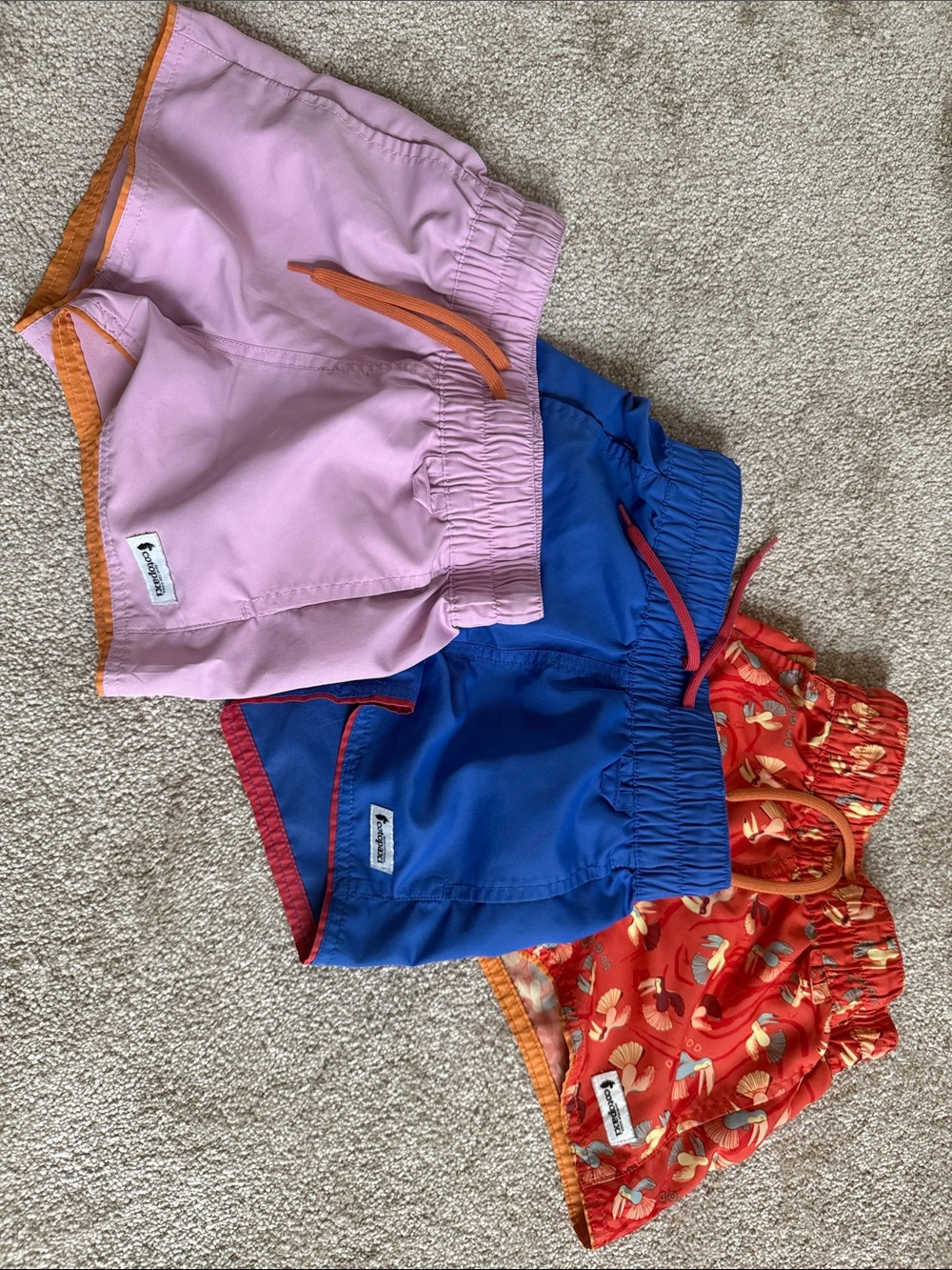 cotopaxi Kids Pink, Blue & Red Patterned Swim Shorts Set